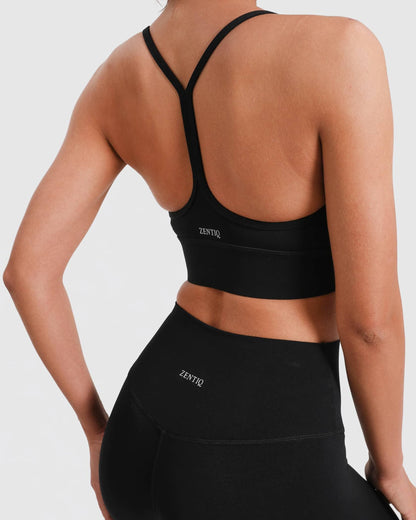 Sport-BH Racerback stützend mit herausnehmbaren Pads – Schwarz